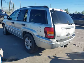 2004 Jeep Grand Cherokee Laredo with VIN 1J4GX48NX4C403936, listed as a IAAI auction lot 40855256 with 241,290 mi miles. Bid and sale history available at carsss.com. Image 3.