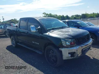 2005 Nissan Titan LE with VIN 1N6AA07B05N509859, listed as a IAAI auction lot 42662424 with 195,394 mi miles and . Bid and sale history available at DreamBid. Image 1.