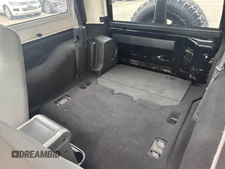 2007 Jeep Wrangler Rubicon with VIN 1J4GA64127L170574, listed as a IAAI auction lot 42474509 with 142,976 mi miles and . Bid and sale history available at DreamBid. Image 8.