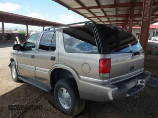 2001 GMC Jimmy SL with VIN 1GKCS13WX12222794, listed as a IAAI auction lot 41949569 with 169,961 mi miles. Bid and sale history available at carsss.com. Image 3.