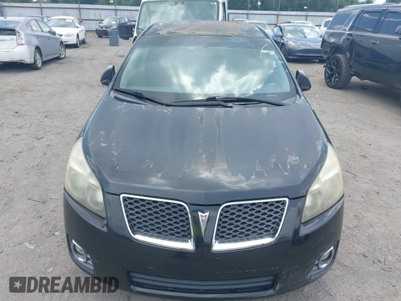2009 Pontiac Vibe 1SB with VIN 5Y2SP67099Z416473, listed as a IAAI auction lot 42766091 with 231,158 mi miles and . Bid and sale history available at DreamBid. Image 6.