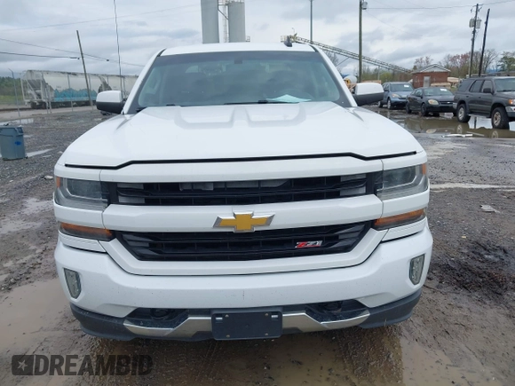2016 Chevrolet Silverado 1500 LT with VIN 3GCUKREC0GG136136, listed as a IAAI auction lot 41971199 with 179,045 mi miles and . Bid and sale history available at DreamBid. Image 12.