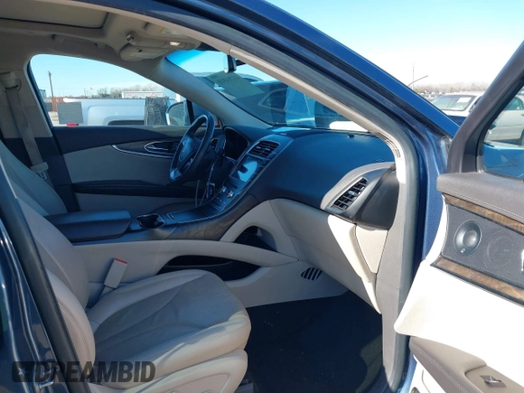 2019 Lincoln Nautilus Reserve with VIN 2LMPJ6LP3KBL51283, listed as a IAAI auction lot 41204810 with 91,184 mi miles and . Bid and sale history available at DreamBid. Image 5.