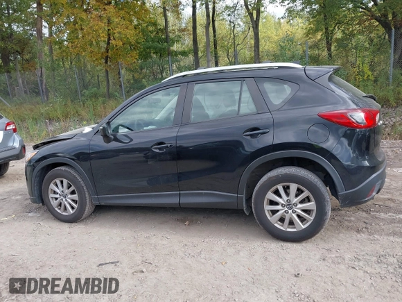 2016 Mazda CX-5 Sport with VIN JM3KE2BE8G0804398, listed as a IAAI auction lot 40490953 with 116,279 mi miles and . Bid and sale history available at DreamBid. Image 13.