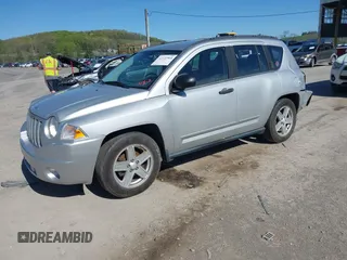 2008 Jeep Compass Sport with VIN 1J8FT47088D784150, listed as a IAAI auction lot 42122964 with 241,302 mi miles. Bid and sale history available at carsss.com. Image 2.