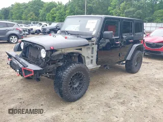 2008 Jeep Wrangler Unlimited Sahara with VIN 1J4GA59128L504798, listed as a IAAI auction lot 42210839 with 162,406 mi miles and . Bid and sale history available at DreamBid. Image 18.