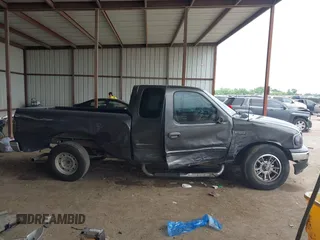 2002 Ford F-150 XL with VIN 1FTRX17242NB82159, listed as a IAAI auction lot 42283839 with 163,685 mi miles and . Bid and sale history available at DreamBid. Image 13.