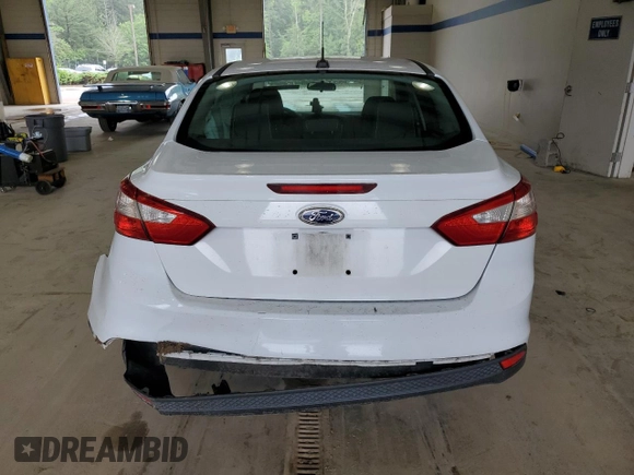 2012 Ford Focus SE with VIN 1FAHP3F20CL451852, listed as a Copart auction lot 60310765 with 150,305 mi miles and Salvage title. Bid and sale history available at DreamBid. Image 6.
