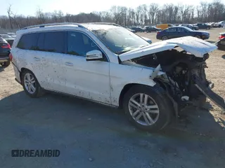2015 Mercedes-Benz GL-Class GL 450 with VIN 4JGDF6EE3FA529626, listed as a IAAI auction lot 41768120 with 124,845 mi miles. Bid and sale history available at carsss.com. Image 1.