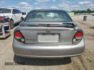 2000 Nissan Maxima GXE z VIN JN1CA31A9YT224416, wystawiony jako Copart lot #55514495 z przebiegiem 234 882 mil mil oraz Szkody całkowita. Historia ofert i sprzedaży dostępna na DreamBid. Obrazek 6.