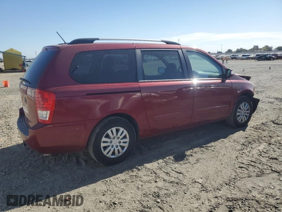 2012 Kia Sedona LX with VIN KNDMG4C79C6483194, listed as a Copart auction lot 77485374 with 110,831 mi miles and Salvage Title. Bid and sale history available at carsss.com. Image 3.