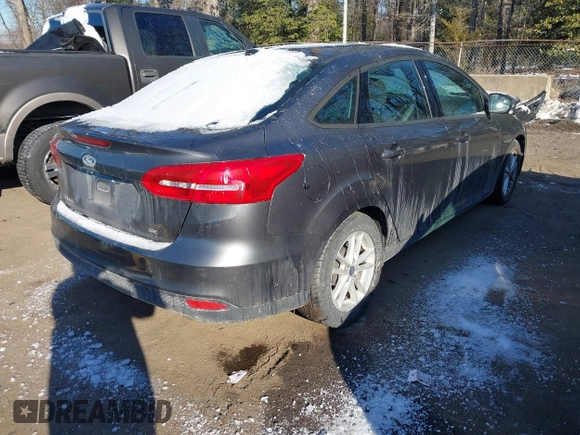 2015 Ford Focus SE with VIN 1FADP3F24FL276766, listed as a IAAI auction lot 41388348 with 59,579 mi miles. Bid and sale history available at carsss.com. Image 4.