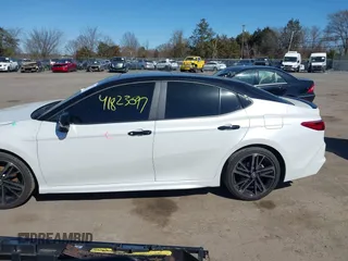 2025 Toyota Camry LE with VIN 4T1DAACK7SU033649, listed as a IAAI auction lot 41823097 with 9,392 mi miles and . Bid and sale history available at carsss.com. Image 14.