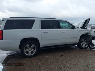 2020 Chevrolet Suburban LT z VIN 1GNSCHKC9LR284936, wystawiony jako IAAI lot #41196246 z przebiegiem Nie podano mil oraz . Historia ofert i sprzedaży dostępna na DreamBid. Obrazek 13.