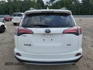 2018 Toyota RAV4 XLE с VIN JTMWFREV8JJ180020, выставлен на аукционе Copart как лот 62836635 с пробегом 58 983 миль миль и Списание • Salvage title. История ставок и продаж доступна на DreamBid. Изображение 6.