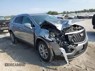 2023 Cadillac XT5 AWD Premium Luxury with VIN 1GYKNDR40PZ152982, listed as a Copart auction lot 69569914 with 24,829 mi miles and Salvage Title. Bid and sale history available at DreamBid. Image 4.