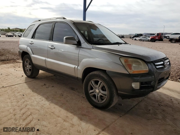 2006 Kia Sportage LX with VIN KNDJF723567206000, listed as a Copart auction lot 82759174 with 130,588 mi miles and Salvage Title. Bid and sale history available at carsss.com. Image 4.