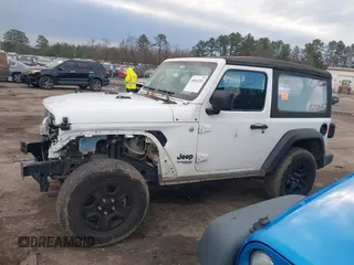 2021 Jeep Wrangler Sport S with VIN 1C4GJXAN6MW677281, listed as a IAAI auction lot 40814351 with 55,360 mi miles and . Bid and sale history available at DreamBid. Image 14.