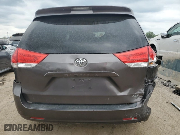 2012 Toyota Sienna XLE AAS z VIN 5TDYK3DC0CS271810, wystawiony jako Copart lot #62958104 z przebiegiem 346 760 mil mil oraz Szkoda całkowita • Salvage title. Historia ofert i sprzedaży dostępna na DreamBid. Obrazek 6.