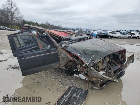 1996 Jeep Cherokee Country with VIN 1J4FJ78S6TL244772, listed as a Copart auction lot 85719794 with 0 mi miles and Salvage Title. Bid and sale history available at carsss.com. Image 4.
