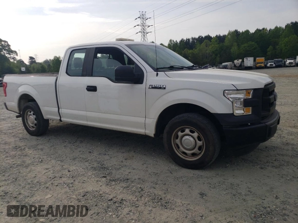 2015 Ford F-150 XL with VIN 1FTEX1C80FFB62967, listed as a Copart auction lot 52552435 with 154,977 mi miles and Salvage title. Bid and sale history available at DreamBid. Image 4.