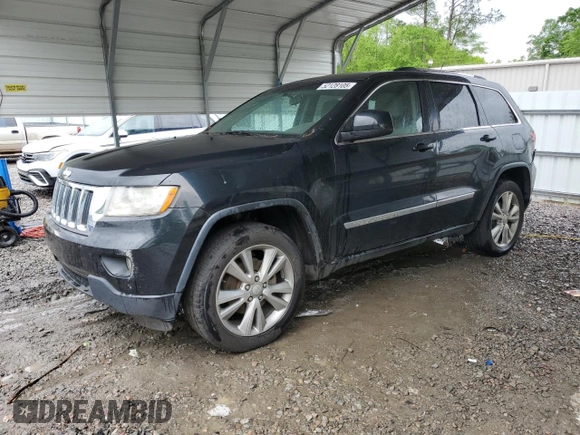 2012 Jeep Grand Cherokee Laredo with VIN 1C4RJEAG1CC316703, listed as a Copart auction lot 52128105 with 203,896 mi miles and Salvage Title. Bid and sale history available at carsss.com. Image 1.