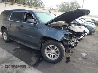 2020 Chevrolet Suburban LT z VIN 1GNSCHKC8LR151570, wystawiony jako IAAI lot #41677348 z przebiegiem Nie podano mil oraz . Historia ofert i sprzedaży dostępna na DreamBid. Obrazek 1.