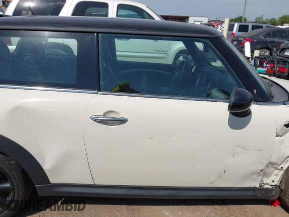2012 MINI Hardtop S with VIN WMWSV3C5XCTY27099, listed as a IAAI auction lot 42248076 with 99,384 mi miles and . Bid and sale history available at DreamBid. Image 13.
