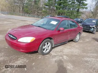 2003 Ford Taurus SE Standard with VIN 1FAFP53UX3G108418, listed as a IAAI auction lot 42042047 with 194,683 mi miles. Bid and sale history available at carsss.com. Image 2.