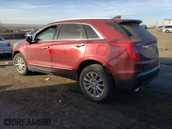 2018 Cadillac XT5 FWD with VIN 1GYKNARS2JZ241702, listed as a Copart auction lot 84031294 with 67,866 mi miles and Salvage title. Bid and sale history available at DreamBid. Image 2.