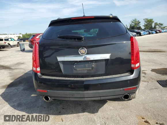 2015 Cadillac SRX Performance Collection with VIN 3GYFNCE32FS558430, listed as a Copart auction lot 63633865 with 153,729 mi miles and Salvage title. Bid and sale history available at DreamBid. Image 6.