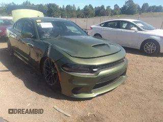 2021 Dodge Charger Scat Pack with VIN 2C3CDXGJ4MH566192, listed as a IAAI auction lot 31198496 with 5,564 mi miles and . Bid and sale history available at DreamBid. Image 1.
