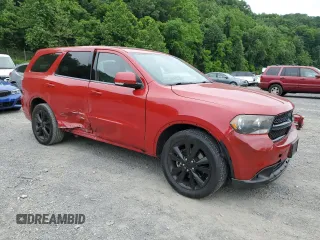 2013 Dodge Durango R/T with VIN 1C4SDJCTXDC688165, listed as a Copart auction lot 61071195 with 139,075 mi miles and Salvage title. Bid and sale history available at DreamBid. Image 4.