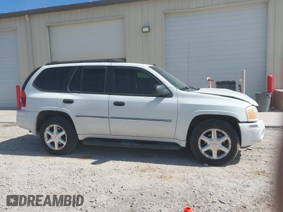 2007 GMC Envoy SLE with VIN 1GKDT13S472223365, listed as a IAAI auction lot 41690531 with 170,539 mi miles. Bid and sale history available at carsss.com. Image 13.