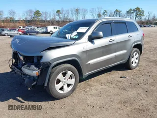 2012 Jeep Grand Cherokee Laredo with VIN 1C4RJFAG0CC145061, listed as a IAAI auction lot 41820140 with 185,015 mi miles. Bid and sale history available at carsss.com. Image 2.