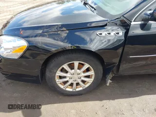2011 Buick Lucerne CXL with VIN 1G4HC5EM1BU135451, listed as a IAAI auction lot 41991089 with 160,075 mi miles and . Bid and sale history available at carsss.com. Image 6.