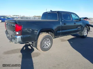 2019 Toyota Tacoma 4WD SR5 with VIN 3TMDZ5BN1KM060088, listed as a IAAI auction lot 41804525 with 69,893 mi miles. Bid and sale history available at carsss.com. Image 4.