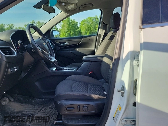 2019 Chevrolet Equinox LT z VIN 2GNAXUEV5K6197499, wystawiony jako IAAI lot #42554301 z przebiegiem 99 345 mil mil oraz . Historia ofert i sprzedaży dostępna na DreamBid. Obrazek 15.