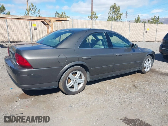 2002 Lincoln LS w/Base Pkg with VIN 1LNHM87A02Y706583, listed as a IAAI auction lot 41809363 with 131,313 mi miles. Bid and sale history available at carsss.com. Image 4.
