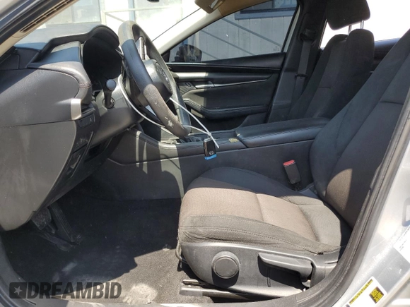 2019 Mazda 3 with VIN 3MZBPABL8KM112754, listed as a Copart auction lot 60616045 with 77,292 mi miles and Clean title. Bid and sale history available at DreamBid. Image 7.