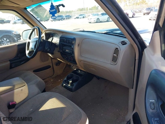 1999 Ford Ranger XL with VIN 1FTYR14X6XTA83979, listed as a IAAI auction lot 41355593 with 201,284 mi miles. Bid and sale history available at carsss.com. Image 5.