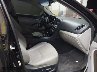 2015 Kia Optima EX with VIN 5XXGN4A75FG382908, listed as a IAAI auction lot 41993509 with 145,273 mi miles. Bid and sale history available at carsss.com. Image 5.
