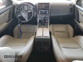 2014 Mazda CX-9 Grand Touring z VIN JM3TB2DVXE0439729, wystawiony jako Copart lot #49188875 z przebiegiem 113 839 mil mil oraz Szkoda całkowita • Salvage title. Historia ofert i sprzedaży dostępna na DreamBid. Obrazek 8.