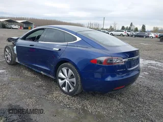 2017 Tesla Model S 100D with VIN 5YJSA1E25HF184502, listed as a IAAI auction lot 41834310 with 92,887 mi miles and . Bid and sale history available at DreamBid. Image 3.