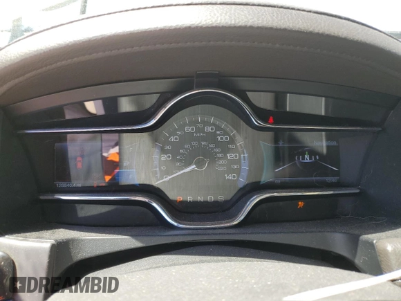 2013 Lincoln MKS с VIN 1LNHL9EK8DG610553, выставлен на аукционе Copart как лот 59160125 с пробегом 128 846 миль миль и Списание • Salvage title. История ставок и продаж доступна на DreamBid. Изображение 9.