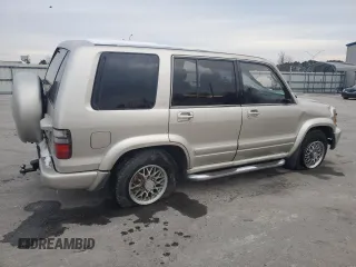 2000 Isuzu Trooper S with VIN JACDJ58X9Y7J18322, listed as a Copart auction lot 42444695 with 149,799 mi miles and Salvage title. Bid and sale history available at DreamBid. Image 3.