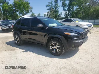 2017 Jeep Cherokee Trailhawk L Plus with VIN 1C4PJMBBXHW517252, listed as a Copart auction lot 51414315 with 185,274 mi miles and Salvage Title. Bid and sale history available at carsss.com. Image 4.