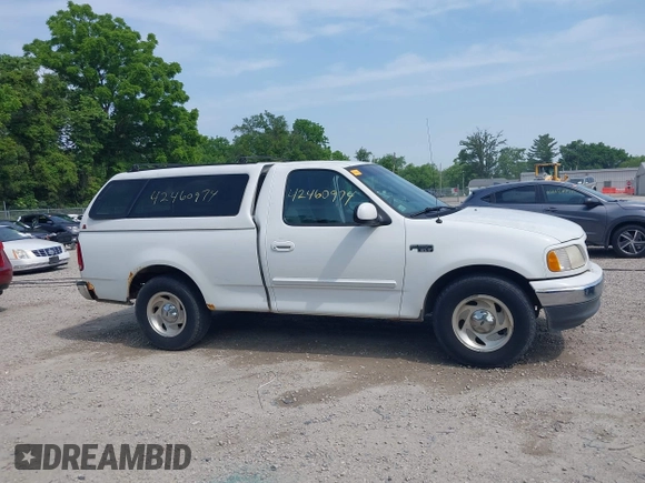 2000 Ford F-150 XL with VIN 1FTZF1720YNB37392, listed as a IAAI auction lot 42460974 with Not provided miles and . Bid and sale history available at DreamBid. Image 13.