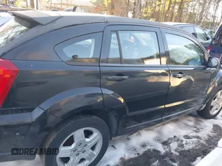 2009 Dodge Caliber SXT with VIN 1B3HB48A89D118869, listed as a IAAI auction lot 41315552 with 198,986 mi miles and . Bid and sale history available at DreamBid. Image 13.