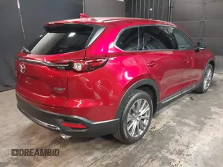 2023 Mazda CX-9 Signature z VIN JM3TCBEY4P0634153, wystawiony jako IAAI lot #42132856 z przebiegiem 25 131 mil mil oraz . Historia ofert i sprzedaży dostępna na DreamBid. Obrazek 4.